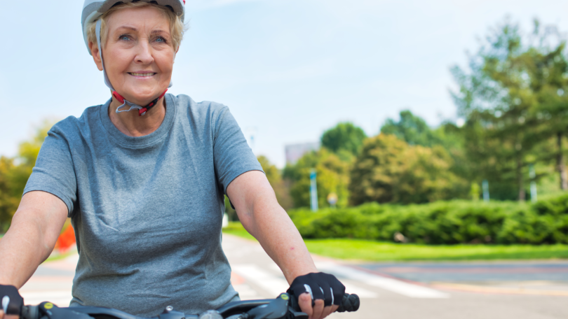 Elderly woman on a bicycle